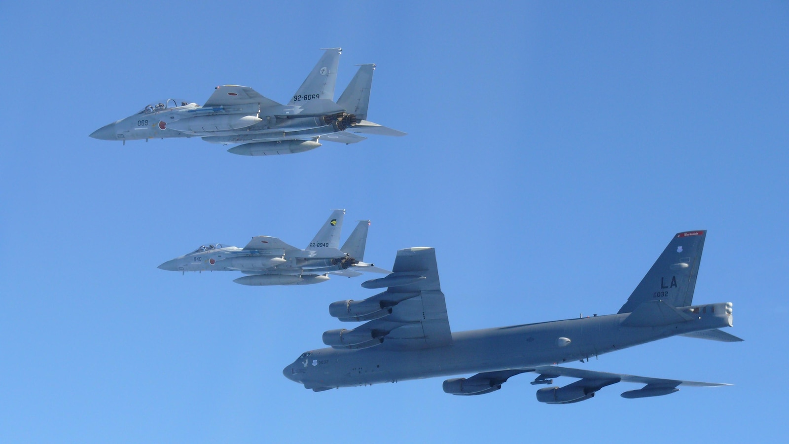 U.S. bombers and Japanese fighters joint air patrol over the Sea of Japan